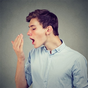 Where does the bad breath locate in the oral cavity? How are the processes to cure it?